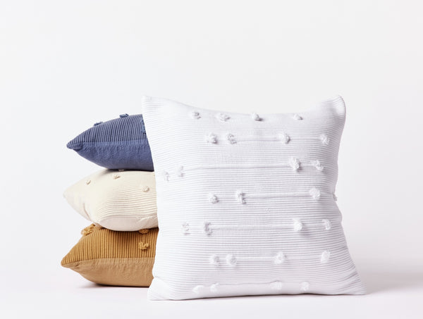 https://www.coyuchi.com/cdn/shop/files/pdp_alma_pillow_all_a_sp22_0858_grande.jpg?v=1700689958